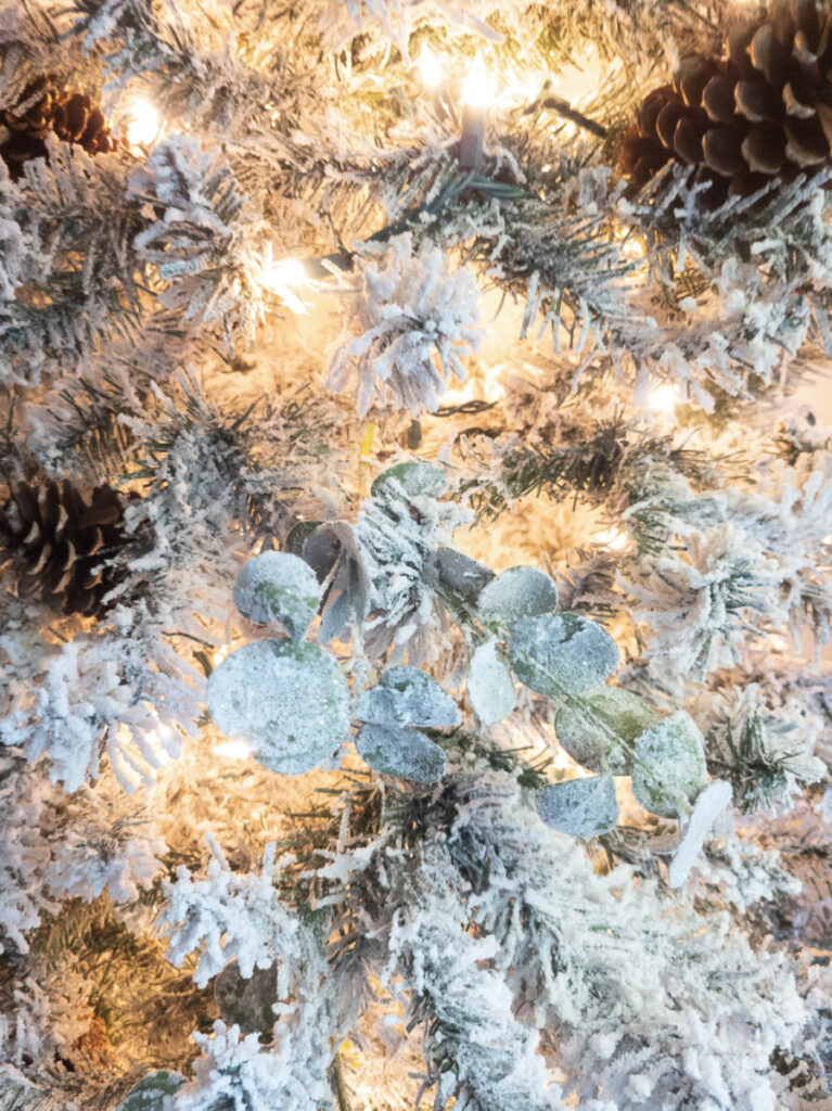 close up of flocked Christmas tree