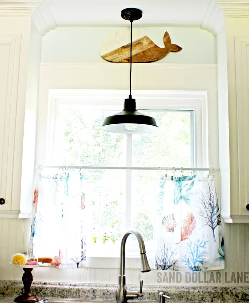 whale cutting board in coastal kitchen