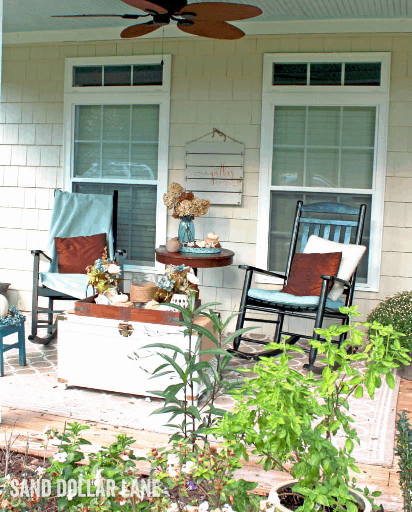 Cosy coastal porch decorated for Fall