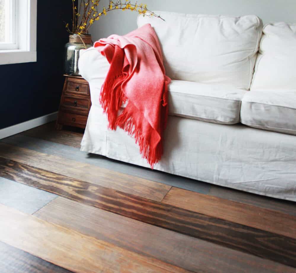 Beautiful wooden flooring with white slipcover couch