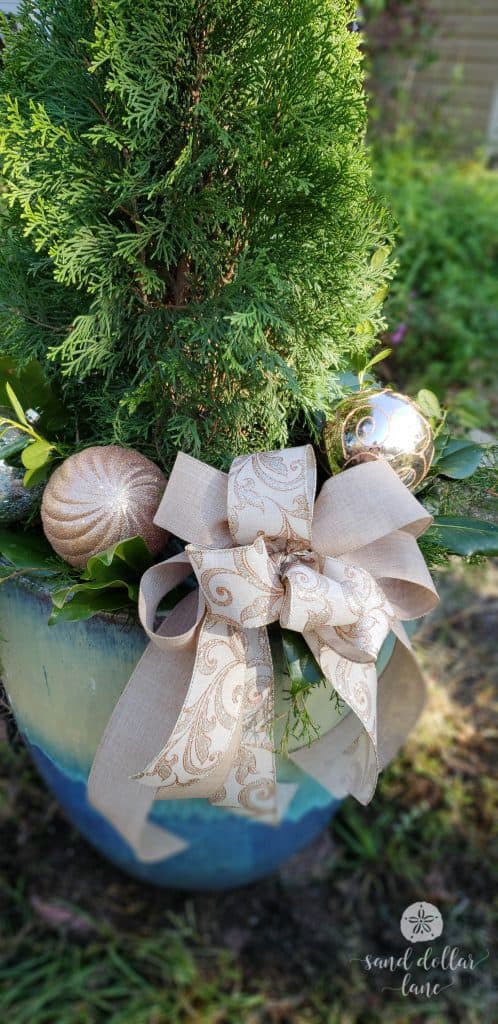 step by step instructions for creating a beautiful outdoor Christmas planter - Sand Dollar Lane