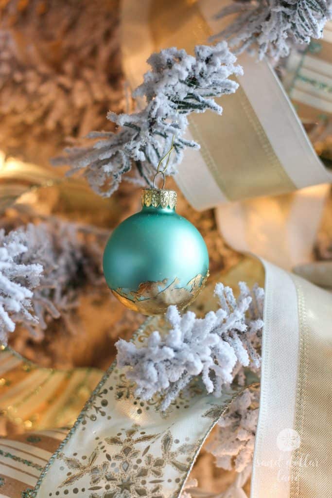 aqua ornament with gold leaf