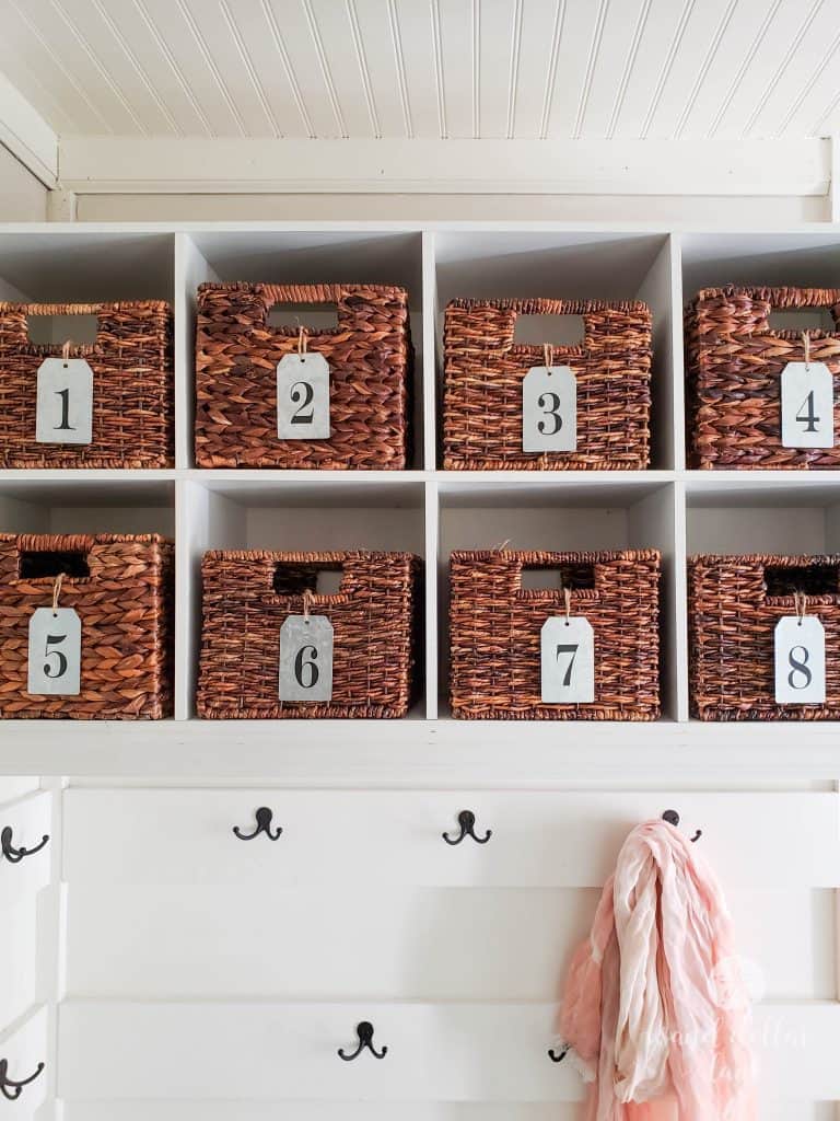 Cute labeled cubbies for an organized mudroom