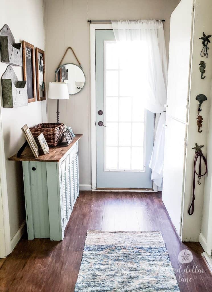 Mudroom glass door with sheer curtain 