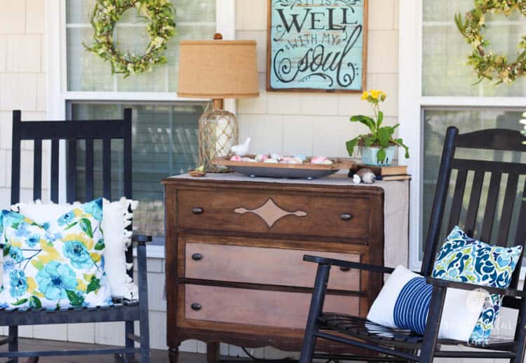 cute wooden dresser on front porch