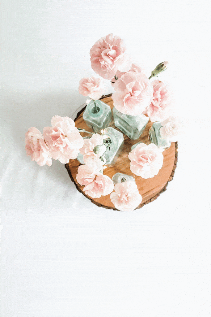 pink flowers in center of table