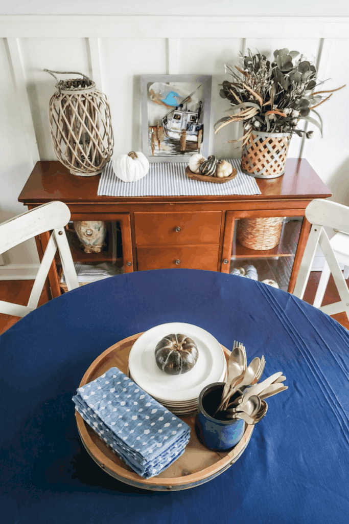 dark blue table decorated for fall