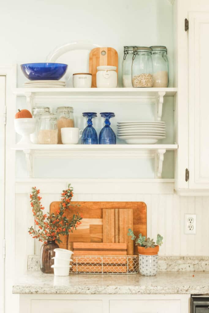 open kitchen shelving in white kitchen