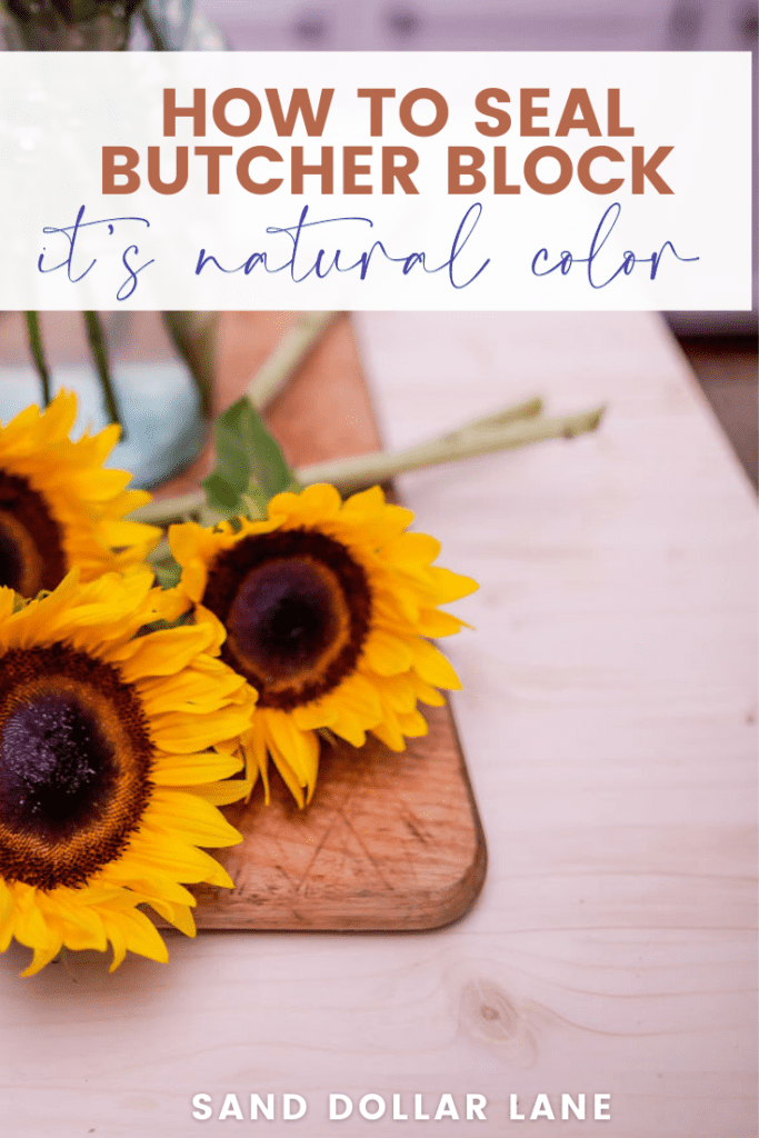 sunflowers on wooden counter