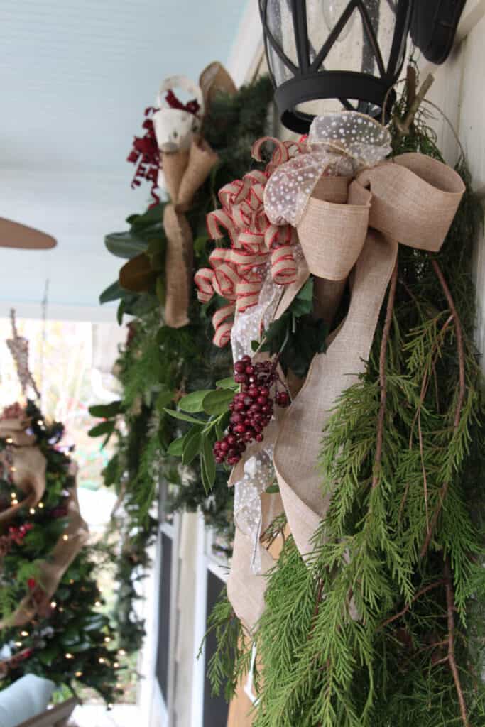 Natural Christmas swag under porch light