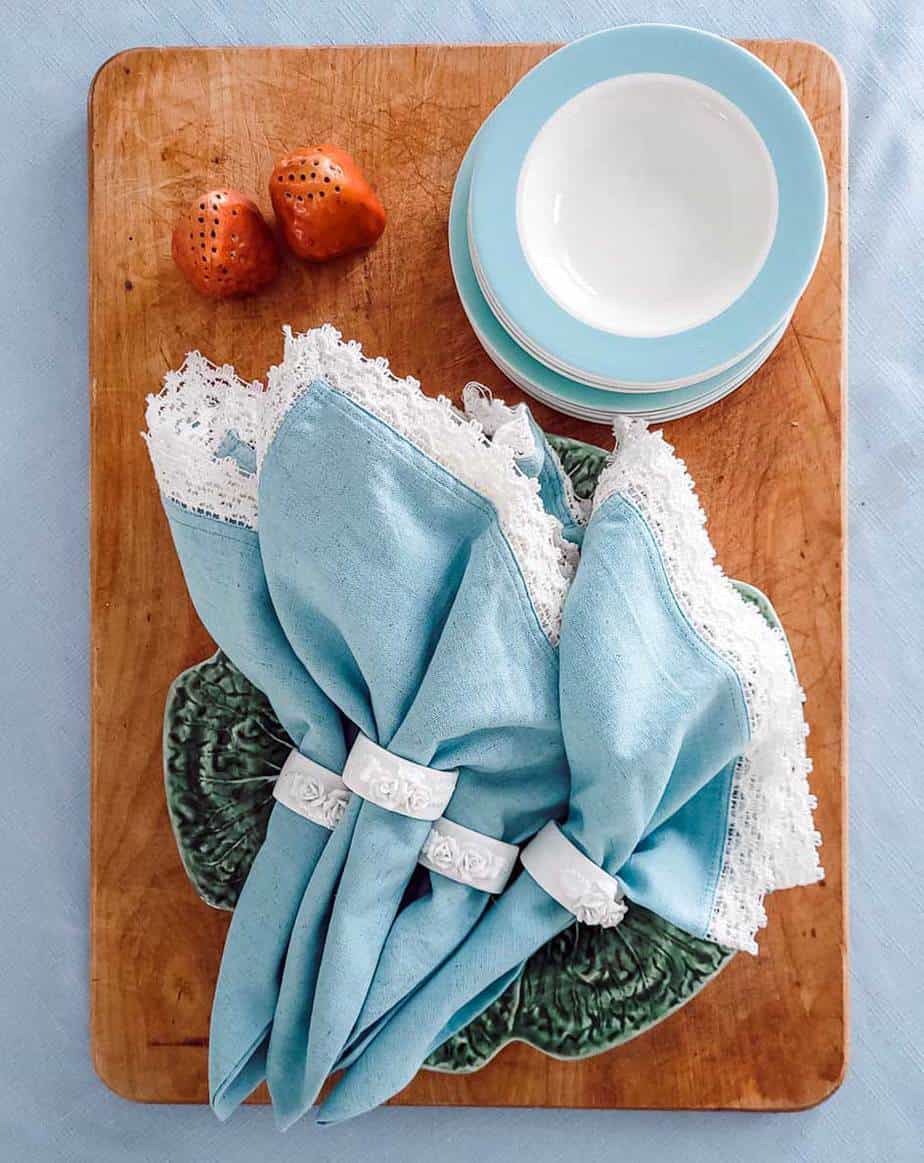 spring tablescape with aqua napkins and vintage dishes