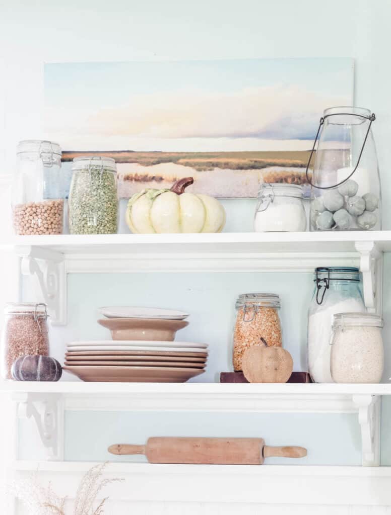 open kitchen shelves decorated for fall