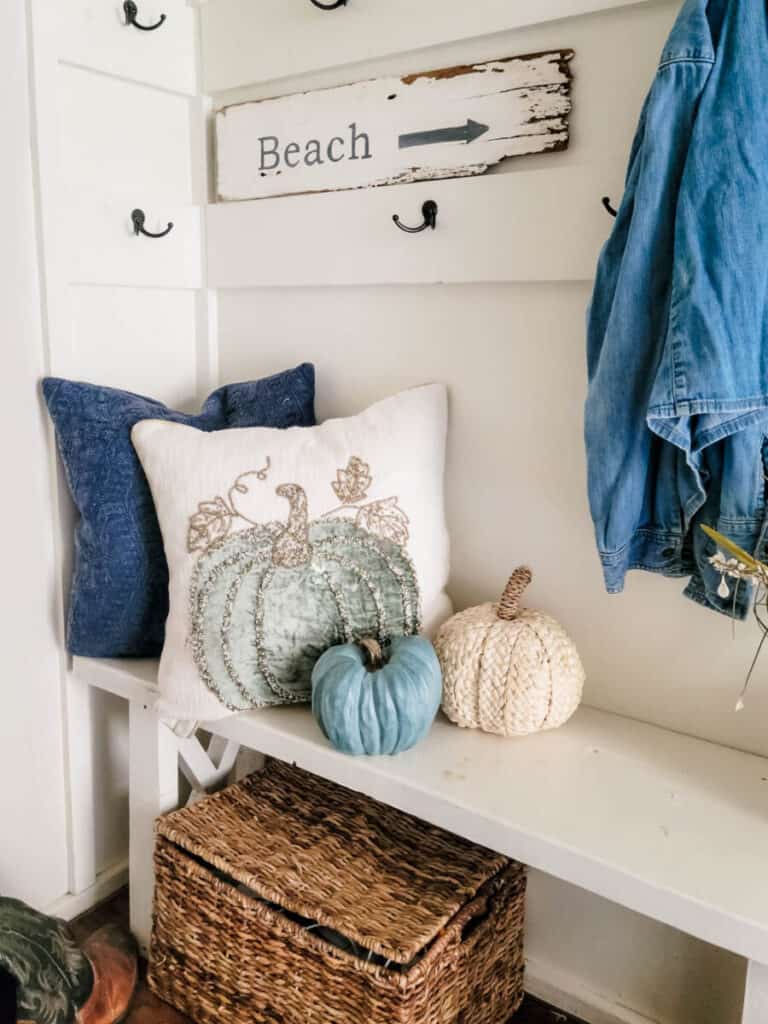 pillows on mudroom entryway bench